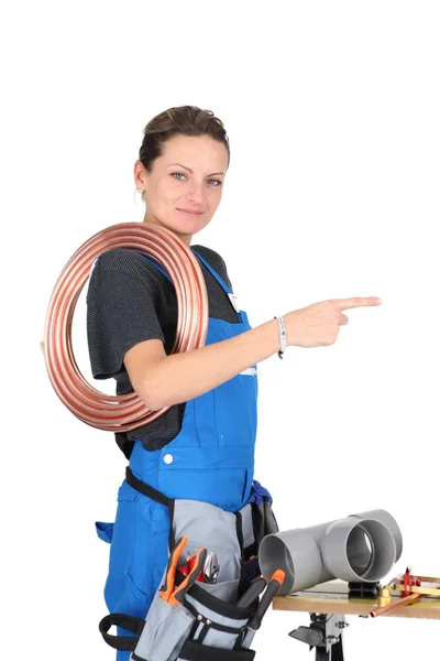 Female plumber with equipment — Stock Photo, Image