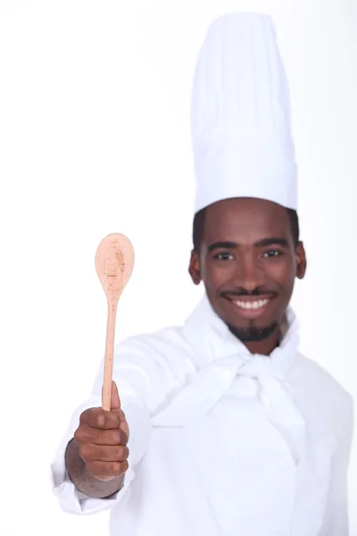 stock image Young cook showing off spoon