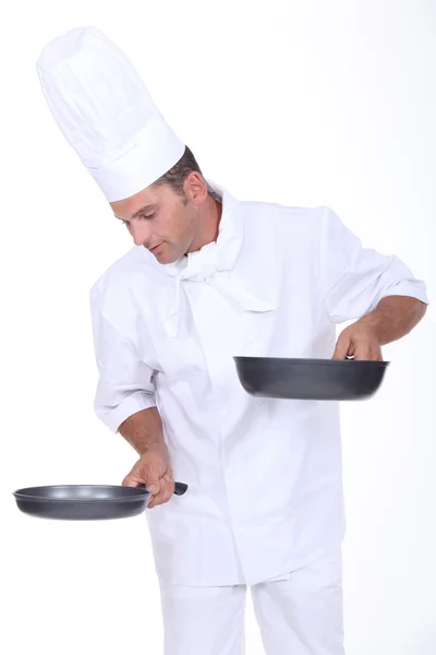 Chef con due casseruole — Foto Stock