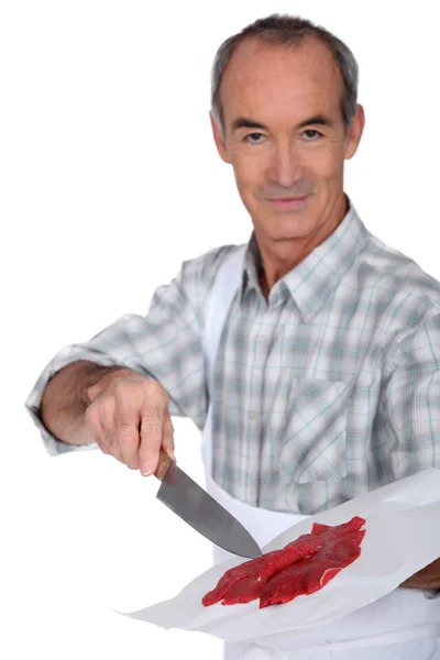 Butcher with fresh red meat — Stock Photo, Image