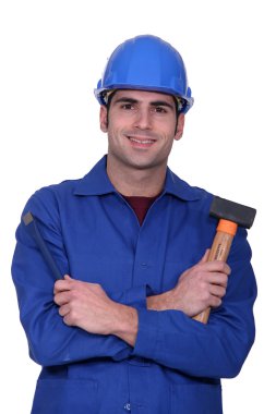 Worker with a mallet clipart