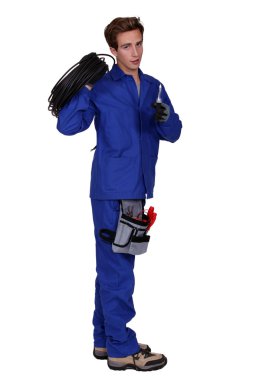 Male electrician holding wiring loom clipart