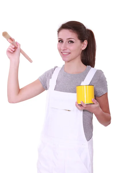 Mujer sosteniendo pintura lata y pincel —  Fotos de Stock