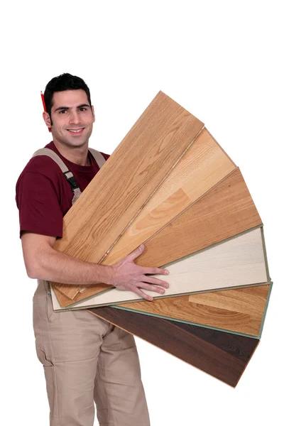 Snickare hålla plywood — Stockfoto