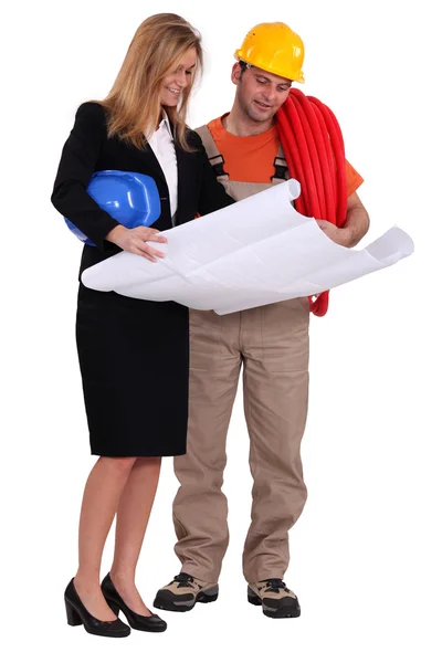 An architect and her foreman. — Stockfoto