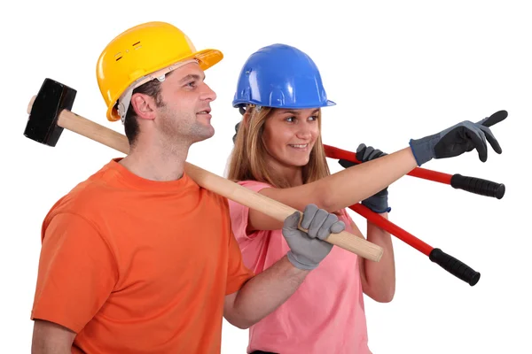 Zwei Bauarbeiter zeigen an — Stockfoto