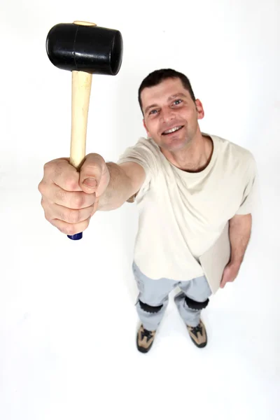 Workman met een hamer — Stockfoto