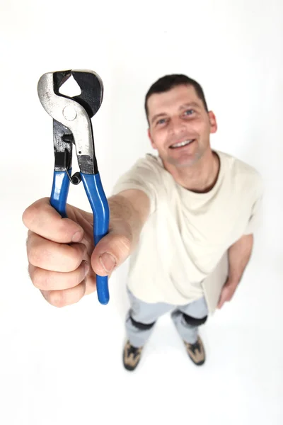 Man holding end-cutting pliers — Stock Photo, Image