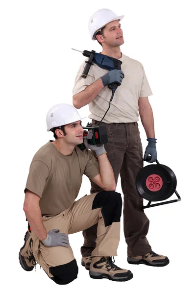 Hantverkare som håller sina verktyg — Stockfoto