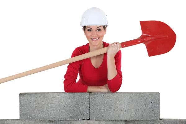 Kadın inşaat işçisi ile hareket eden — Stok fotoğraf