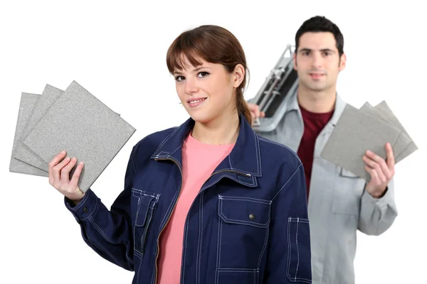 Couple with tile cutter — Stock Photo, Image