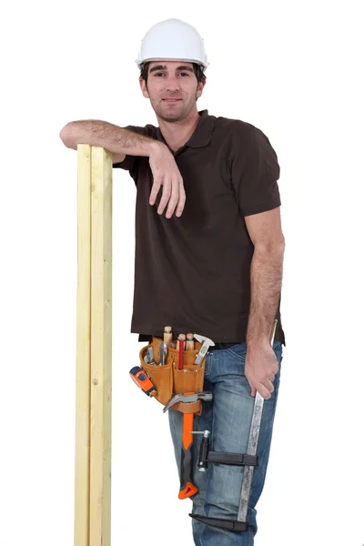 Carpenter with planks of wood — Stock Photo, Image