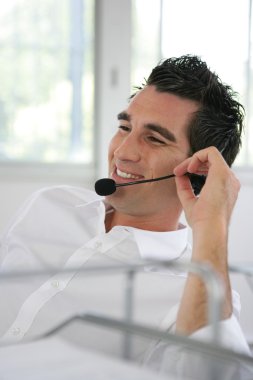 Man wearing a headset clipart