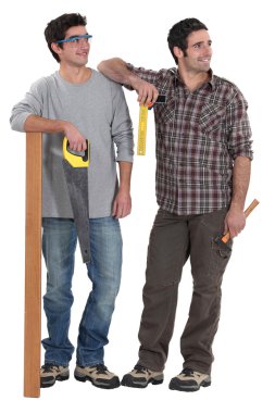 Tradesmen being distracted by an attractive woman clipart