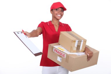 Young courier delivering parcels clipart