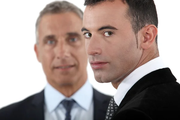 Young and old businessmen — Stock Photo, Image