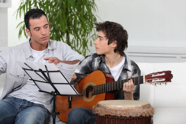 Father and son with a guitar — Stock Photo, Image