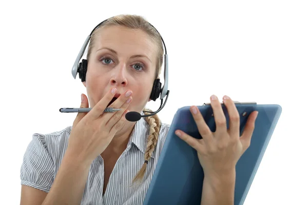 Call-center worker yawning Stockfoto
