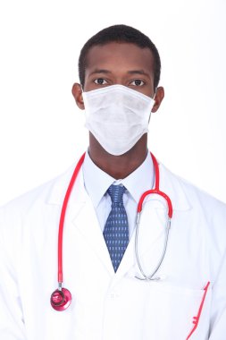 Young African doctor wearing face mask clipart