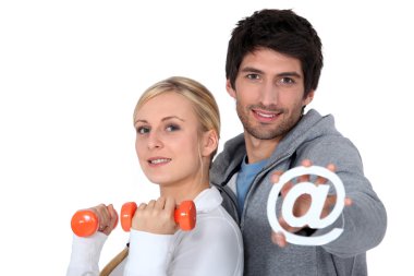 Couple joined the gym via the internet clipart