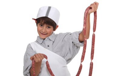 Child with string of sausages clipart