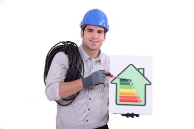 Craftsman holding an energy consumption label clipart