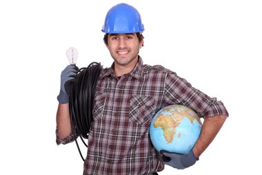 Eager electrician installing electrical systems abroad clipart