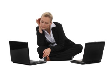 Businesswoman with two laptops clipart