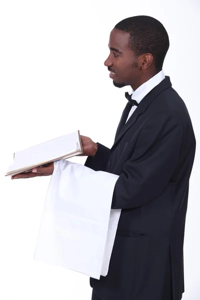 stock image Black waiter giving the bill