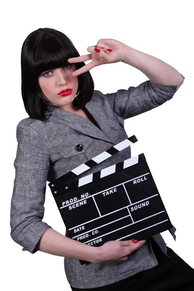 Vrouw met een Filmklapper — Stockfoto