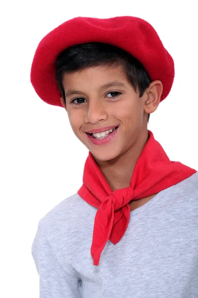 Kind met rode baret — Stockfoto