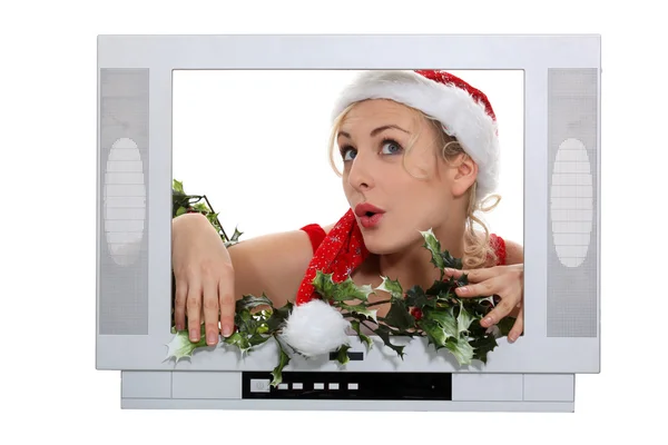 Female Santa behind TV frame — Stock Photo, Image