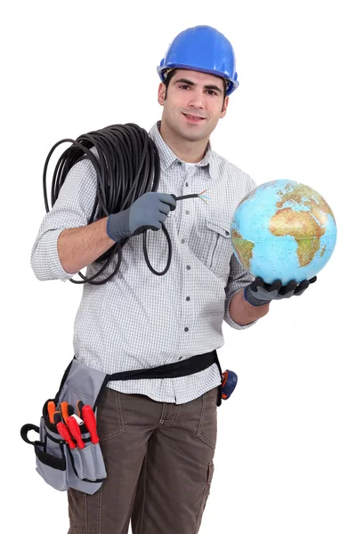 Electrician wiring the world — Stock Photo, Image