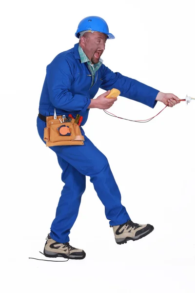 Electrician having an accident — Stock Photo, Image