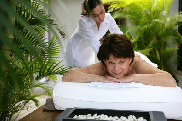 Woman enjoying a back massage — Stock Photo, Image