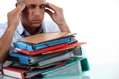 Man with stack of work clipart