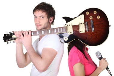 Guitarist covering his band mate's face clipart