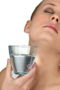 Woman with glass of water clipart