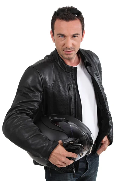 Biker holding helmet — Stock Photo, Image