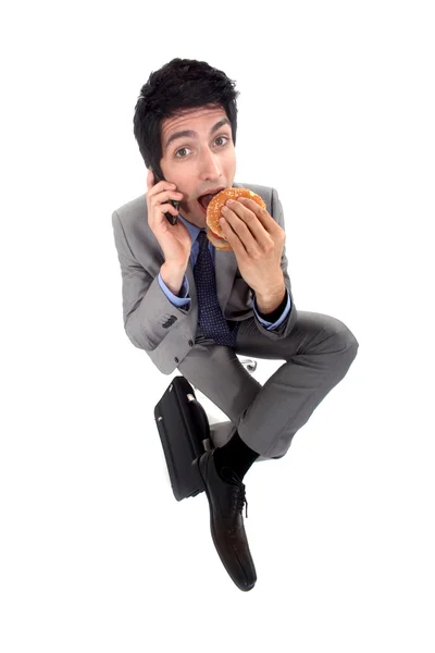 Άνθρωπος τρώει χάμπουργκερ — Φωτογραφία Αρχείου