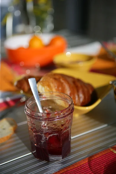 Jam pot on a breakfast table — Stock Photo, Image