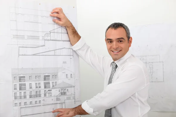 Smiling architect presenting project — Stock Photo, Image