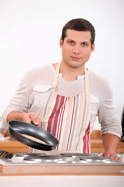Man cooking Royalty Free Stock Images