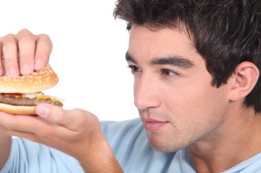 Portrait of a young man with hamburger clipart