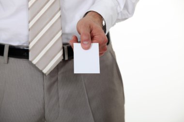 Businessman offering his card clipart