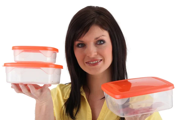 Brunette with lunch boxes — Stock Photo, Image