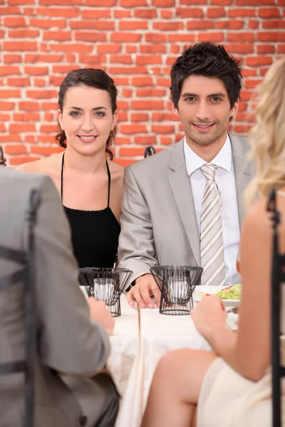 Friends in a restaurant — Stock Photo, Image