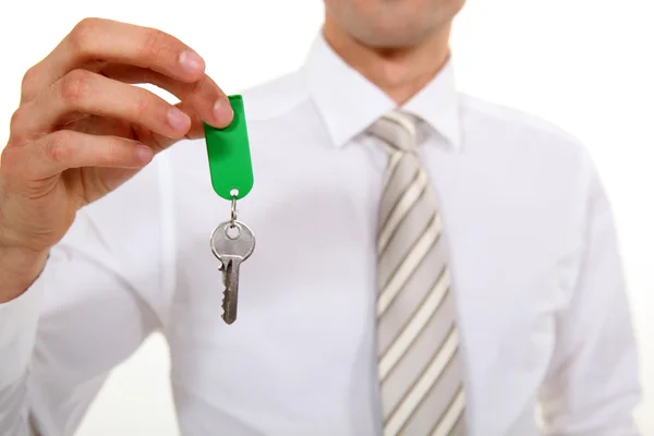 Podnikatel dává klíč — Stock fotografie