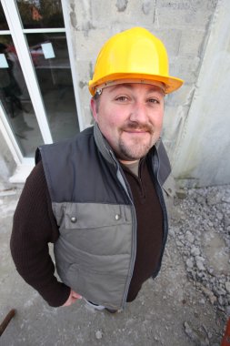 Builder on a construction site clipart