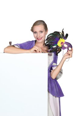 Woman in fancy dress costume with blank board ready for text clipart